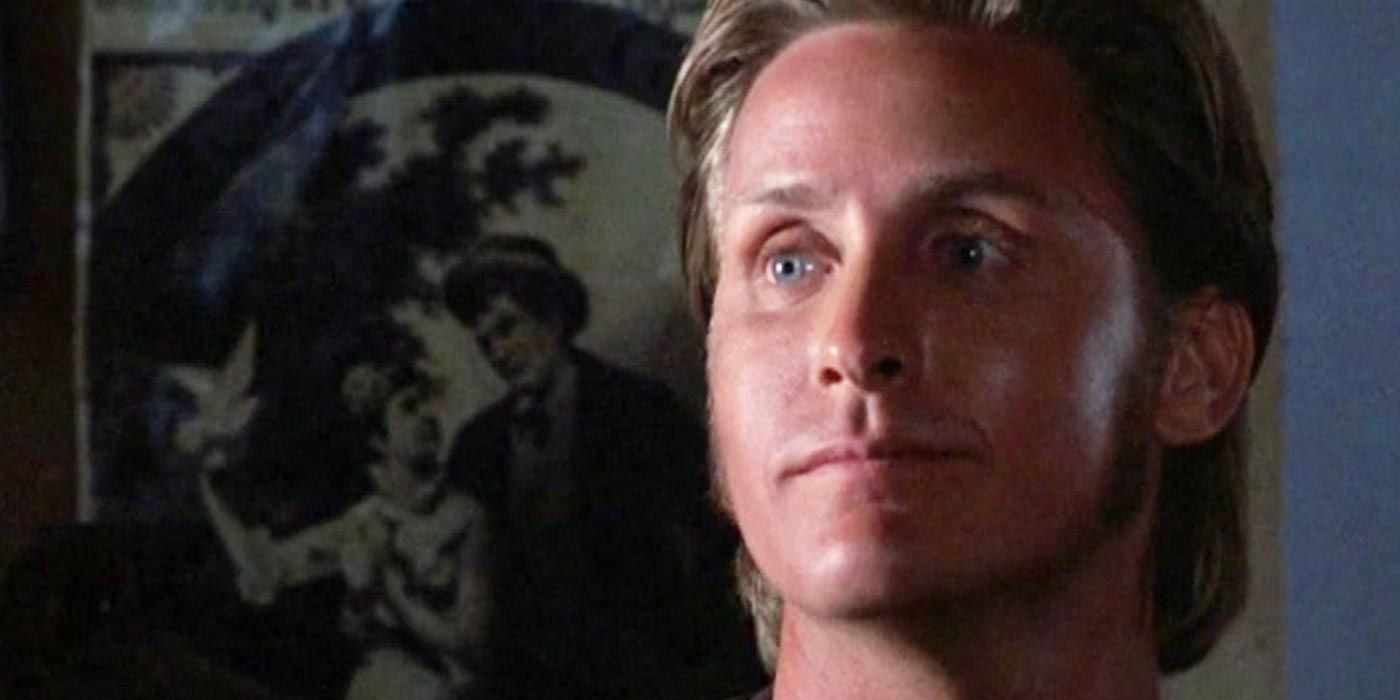 Emilio Estevez as Billy the Kid looking at another character in Young Guns.