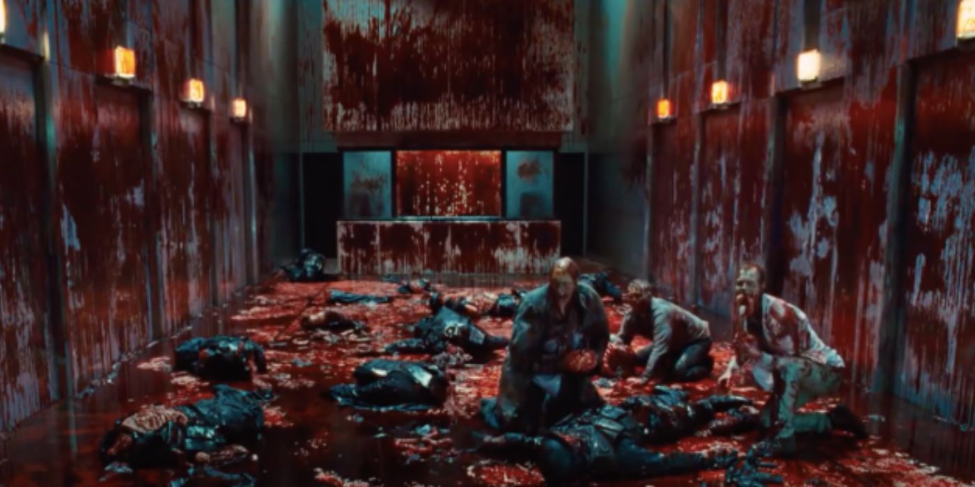 Zombies eating victims with blood all over the walls in The Cabin in the Woods