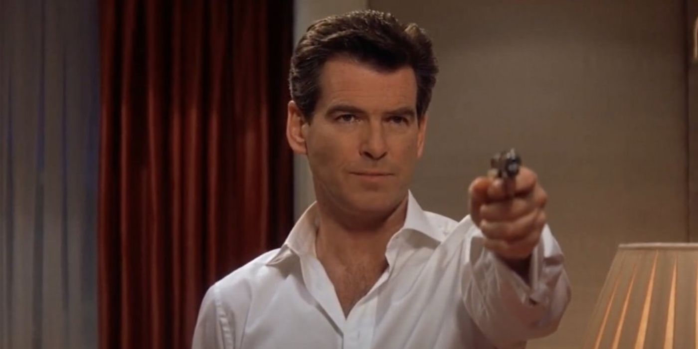 James Bond (Pierce Brosnan) stoically aims his Walther PPK at an off-screen foe in a hotel room in Die Another Day