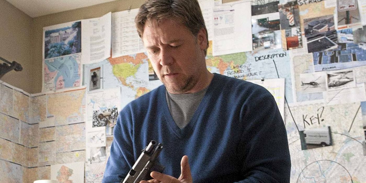 Russell Crowe holding a gun in The Next Three Day