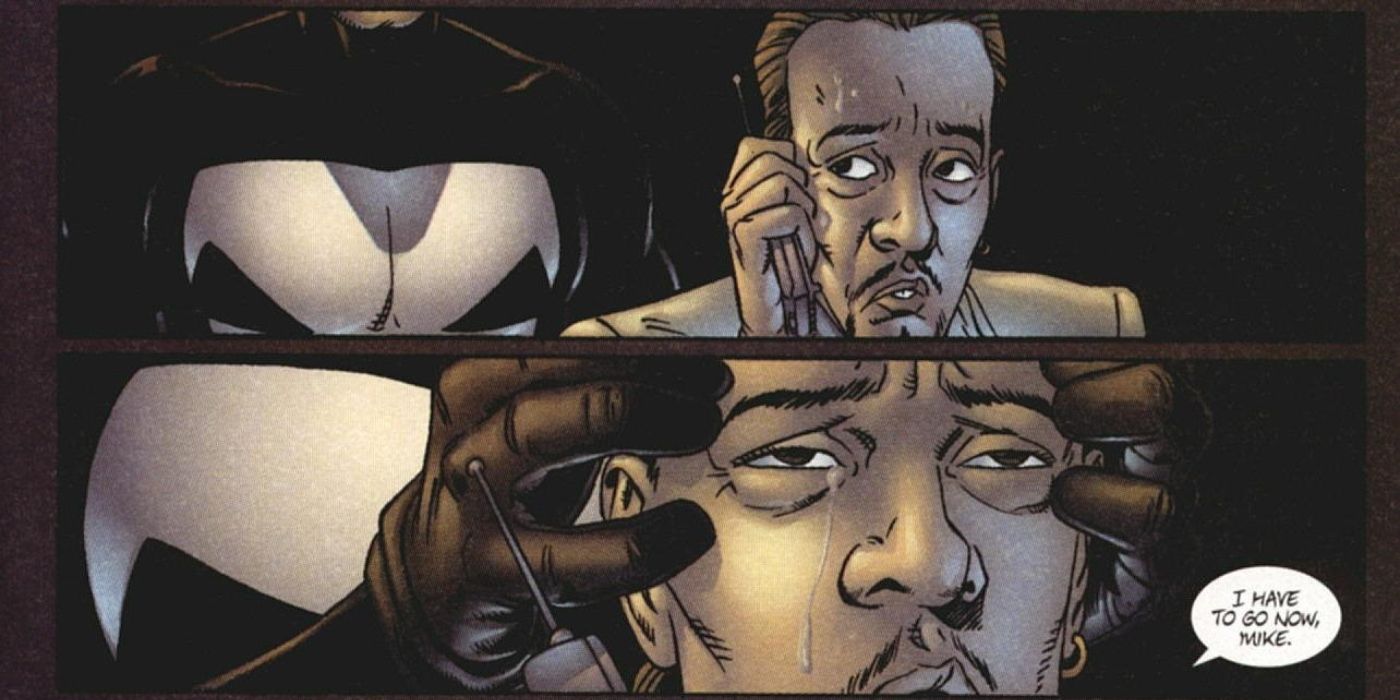 The Punisher grabbing a man&rsquo;s head.