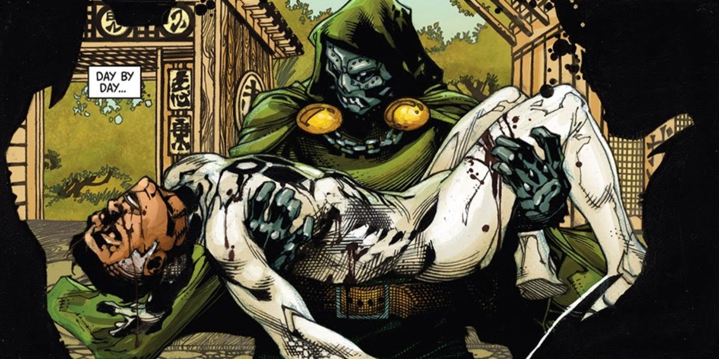 Doctor Doom cradling Reed Richard's corpse. 