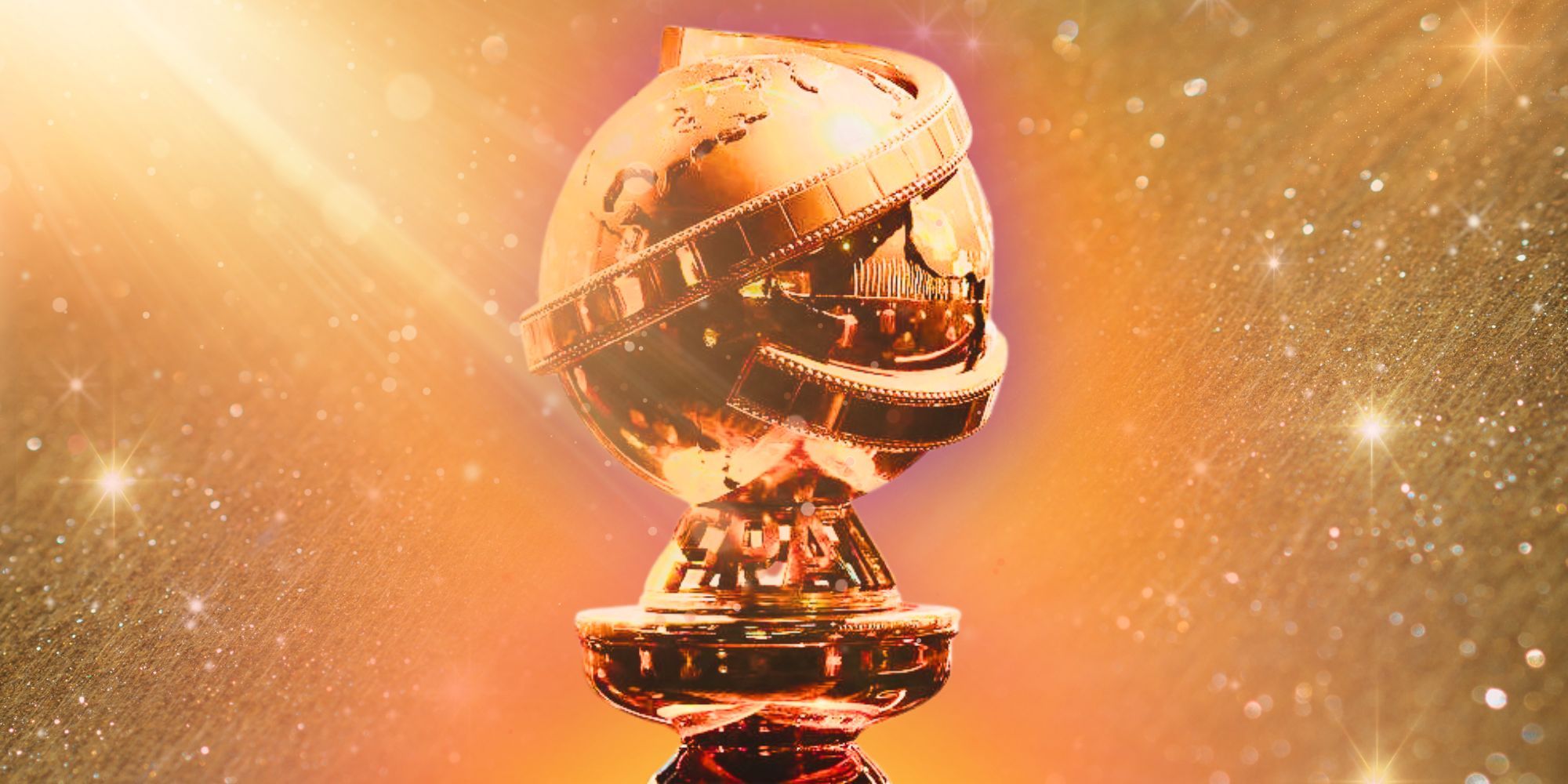 Golden Globes statue surrounded by sparkles and light