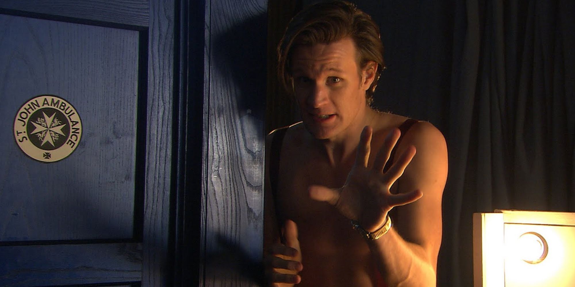 Matt Smith as the Eleventh Doctor wearing only suspenders and looking worried in the 2011 Children In Need special