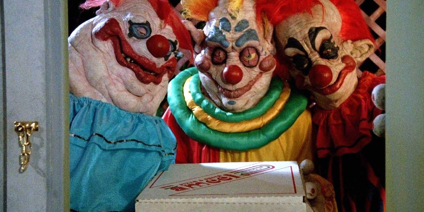 A group of klowns at the door in Killer Klowns from Outer Space