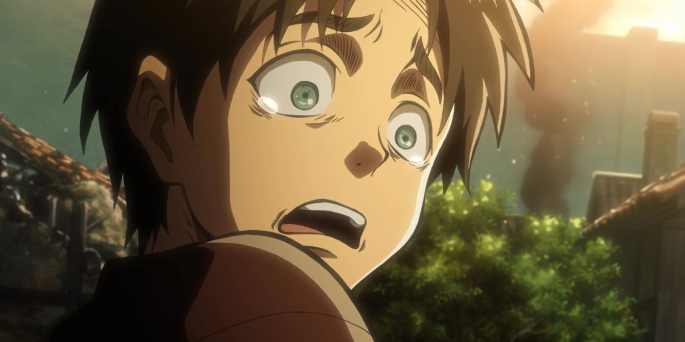 A young eren is terrified after seeing his mother trapped under the rubble in Attack on Titan