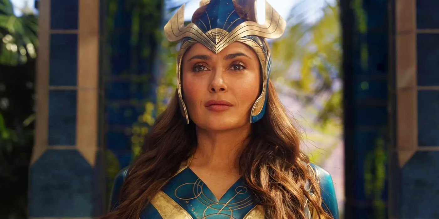 Ajak (Salma Hayek) looks off-screen in the Eternals