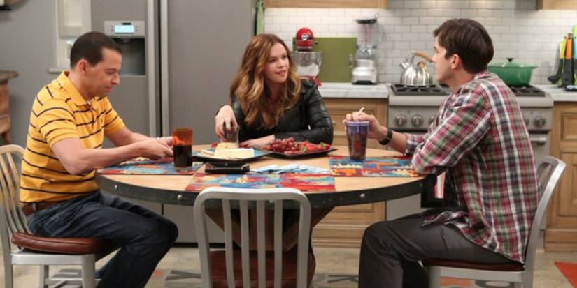 Alan and Walden sitting at the kitchen table with Jenny in the Two and a Half Men episode On Vodka On Soda On Blender On Mixer