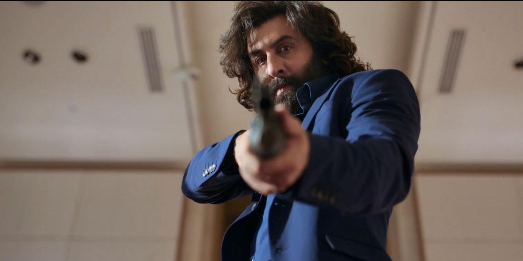 Ranbir Kapoor pointing a gun in Animal