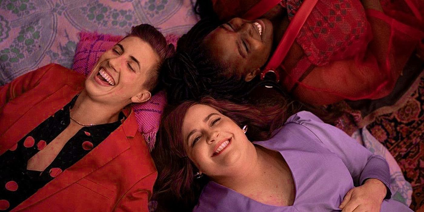 Annie (Aidy Bryant), Fran (Lolly Adefope),  Emily (E. R. Fightmaster) and all lying on the ground with their heads together, laughing in Shrill.