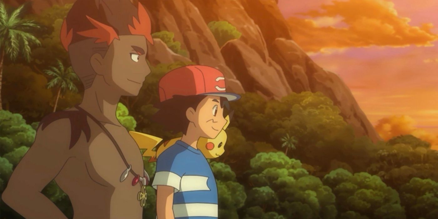 A boy with red and black hair and a boy with a red hat look into the distance.