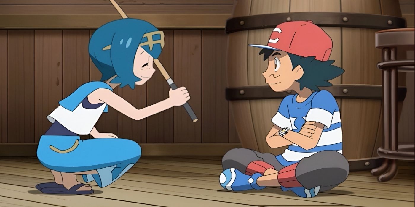 A blue-haired girl kneels down to smile at a boy in a red hat.