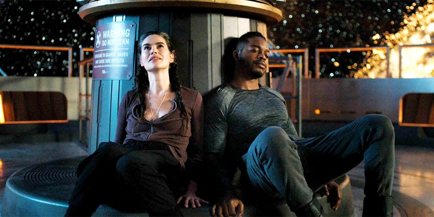 Aster looking up at something and sitting next to a sleeping Halan in Beason 23