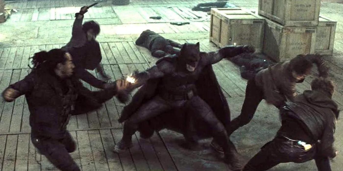 Batman (Ben Affleck) fights multiple gunmen in the Batman v Superman: Dawn of Justice warehouse fight scene