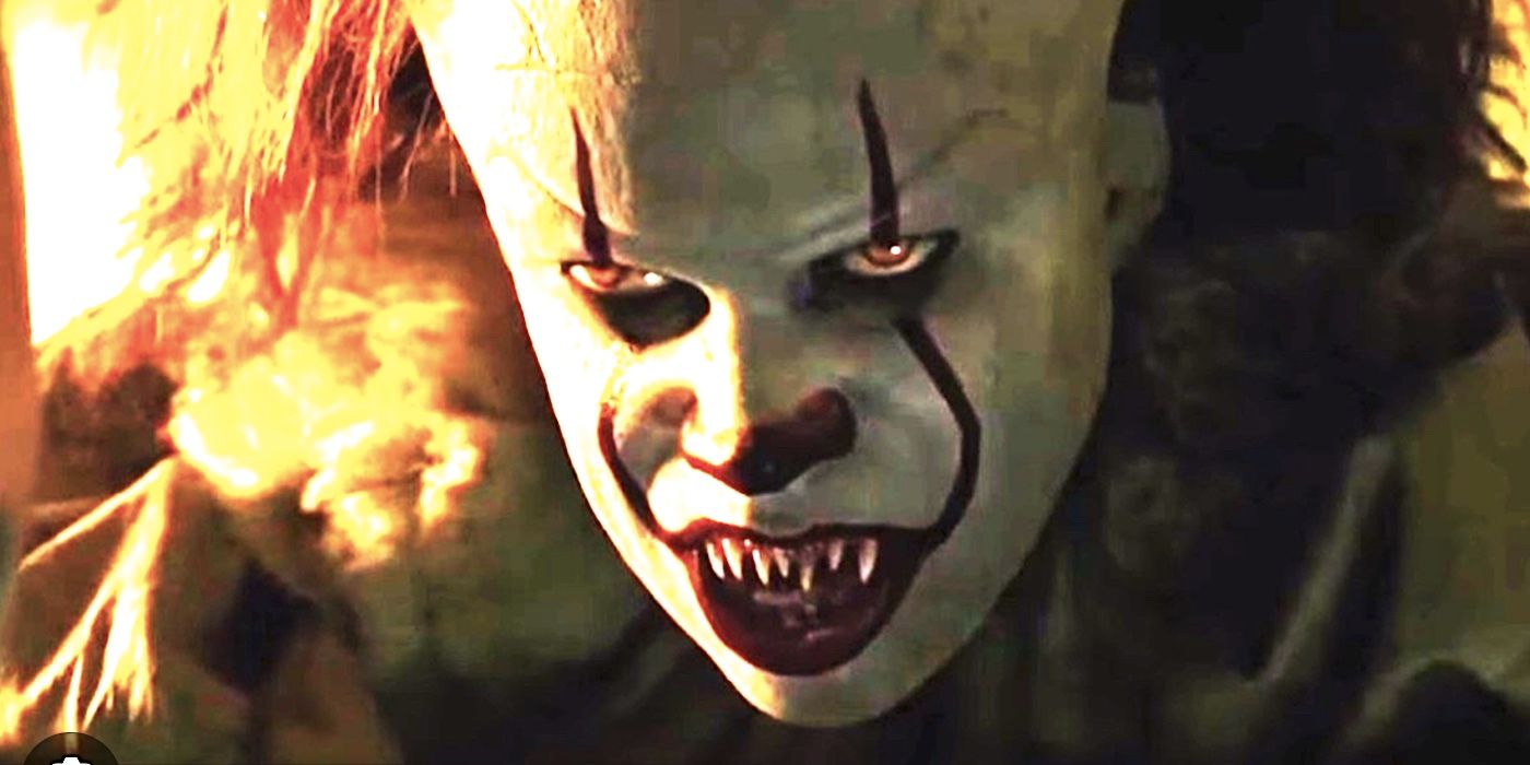 Bill Skarsgard's Pennywise glaring with his teeth bared in IT 2017