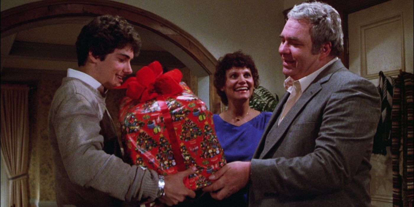 Billy receiving a Christmas gift in Gremlins