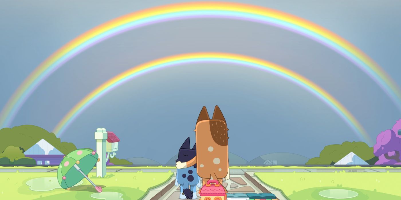 Bluey and Chilli looking at a double rainbow