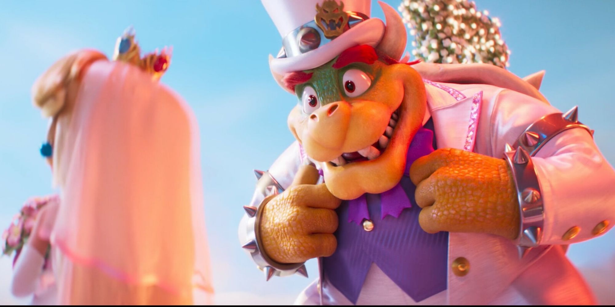 Bowser (Jack Black) looking sharp for his wedding with Peaches (Anya Taylor-Joy), whose back is turned against Bowser in The Super Mario Bros. Movie