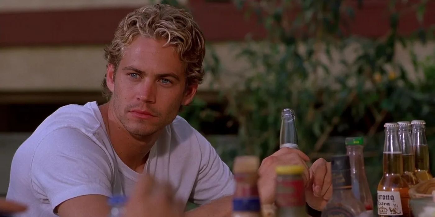 Paul Walker as Brian O'Connor drinking bear in The Fast and the Furious