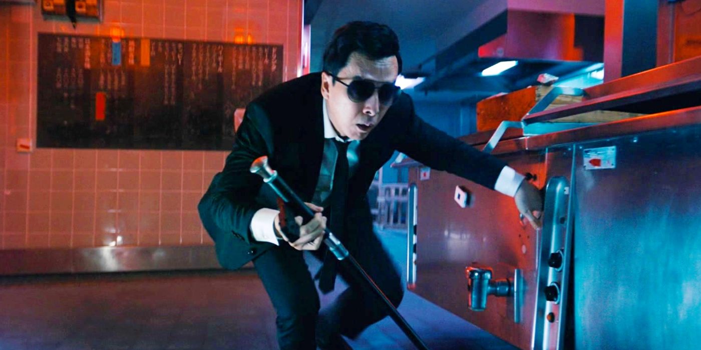 Caine (Donnie Yen) feeling his way along a kitchen cabinet in John Wick: Chapter 4
