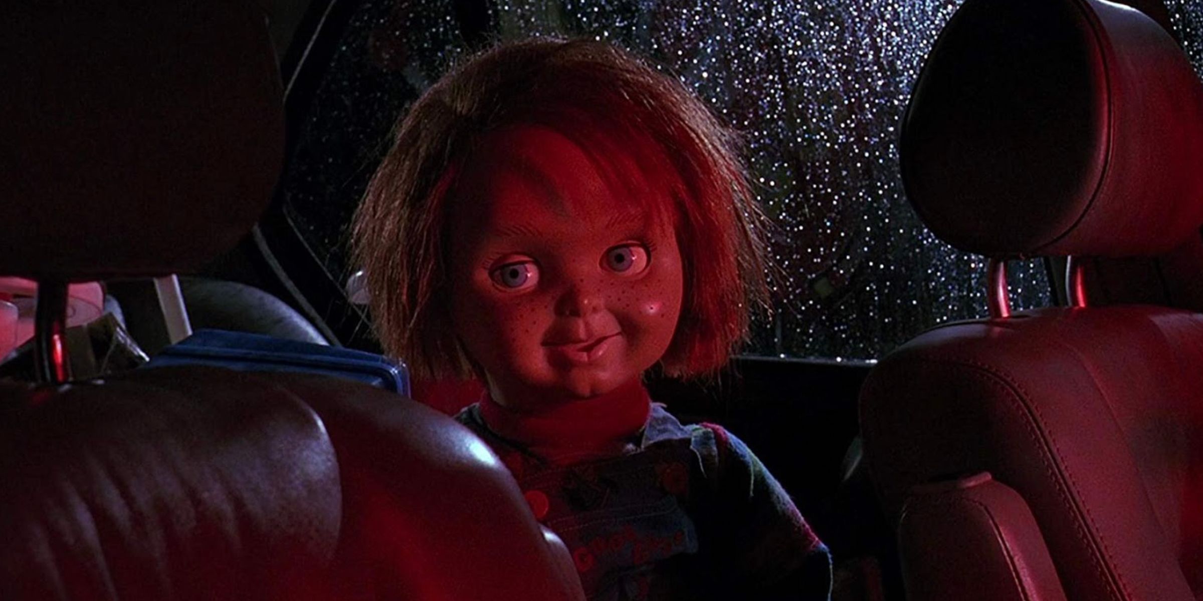 Chucky in the back seat of a car in Childs Play 2