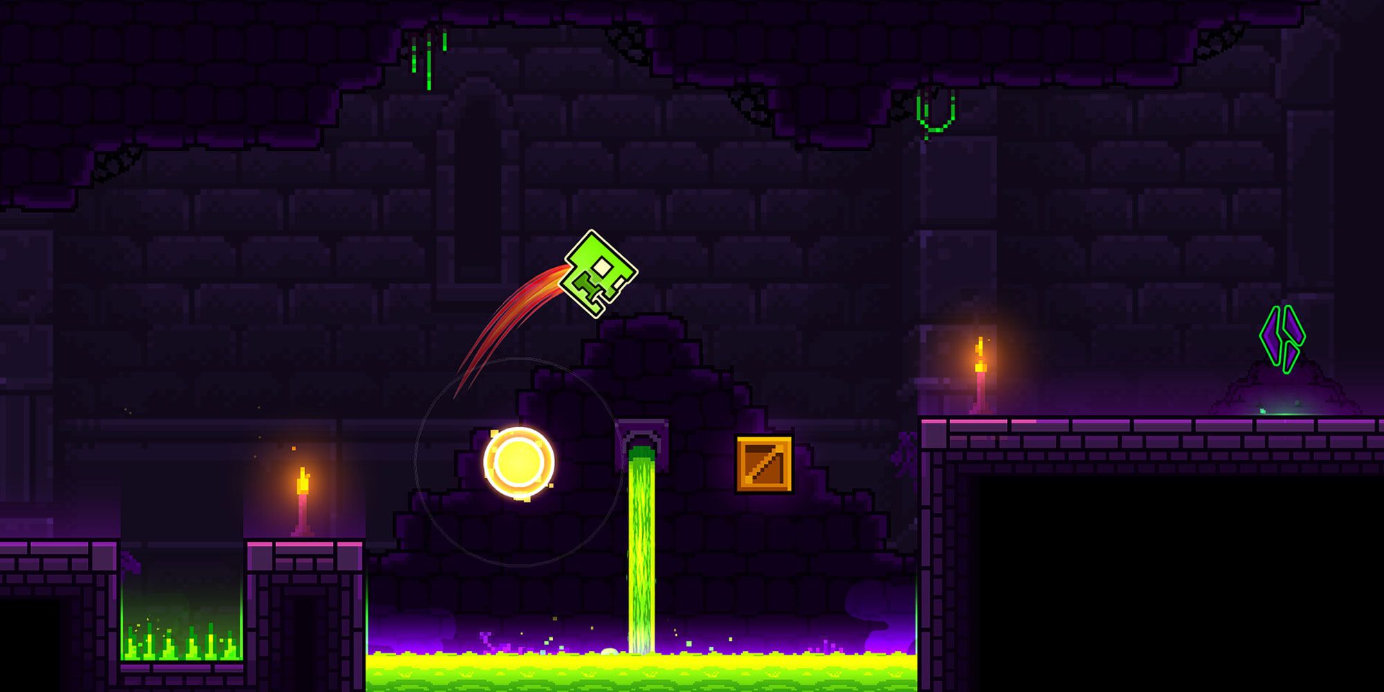 A green skull jumping over a pit of acid onto a crate.