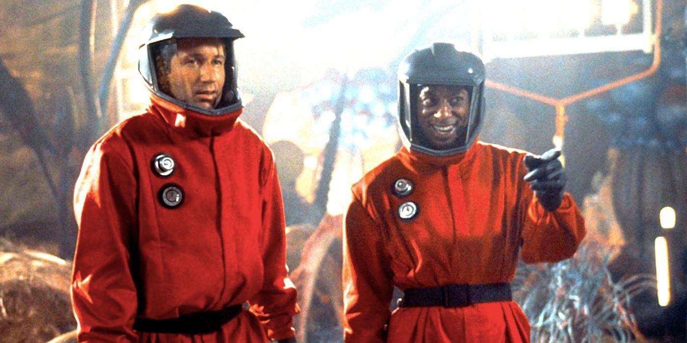 David Duchovny's Ira and Orlando Jones' Harry standing together in Hazmat suits in Evolution 2001