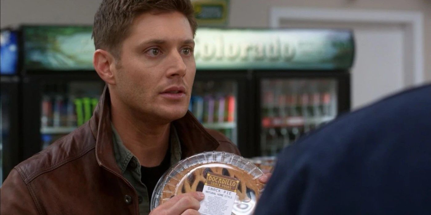 Jensen Ackles as Dean Winchester holding pie in Supernatural