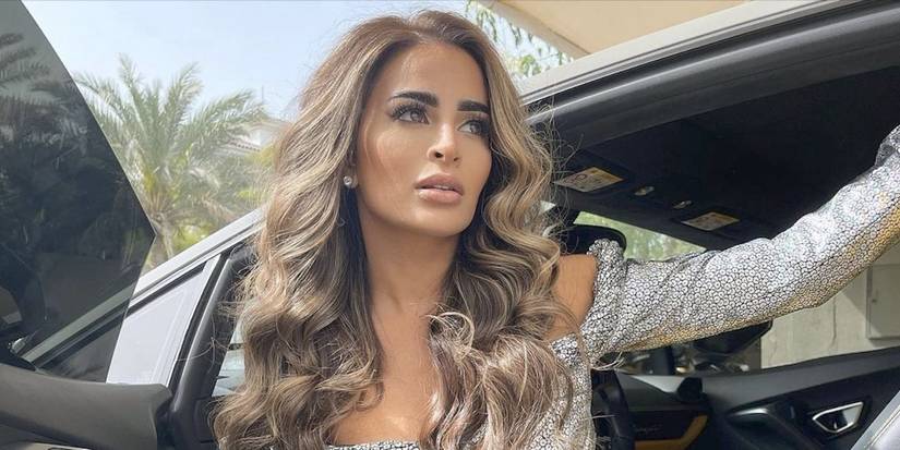 Dubai Bling Safa Siddiqui looking up while getting out of the car