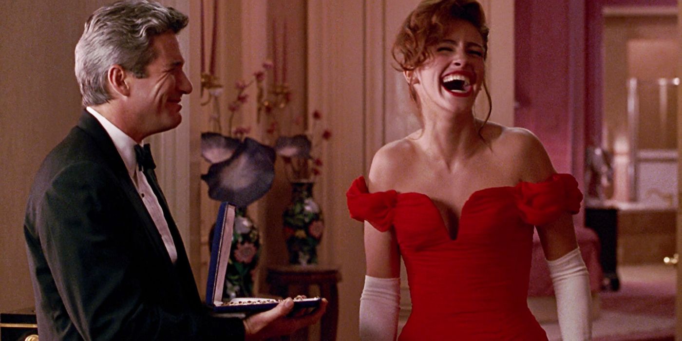 Edward (Richard Gere) and Vivian  (Julia Roberts) laughing in Pretty Woman