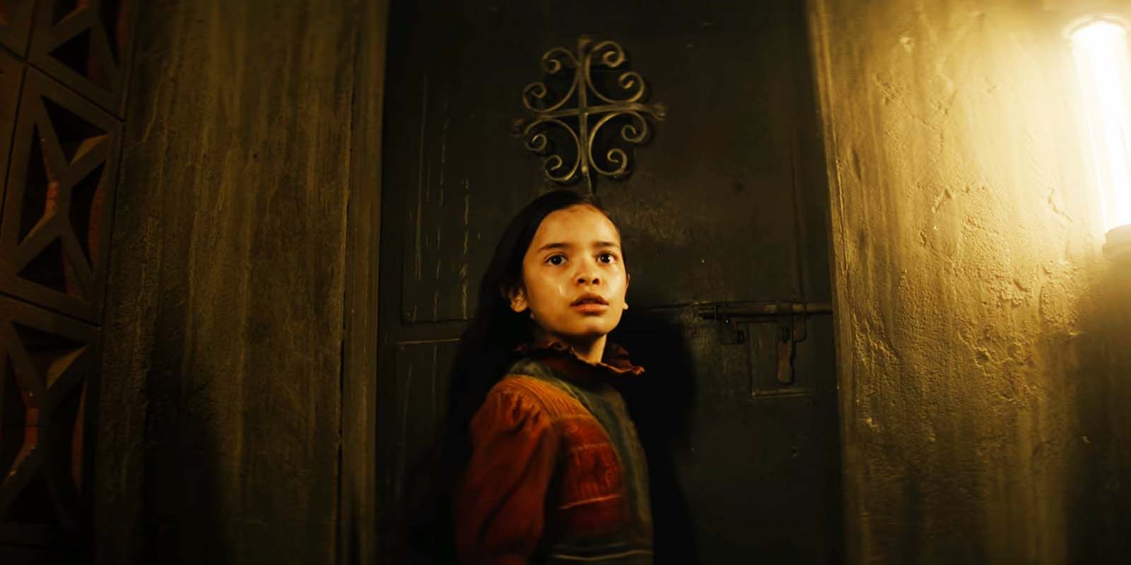 Elizabeth Martinez as young Kora in Rebel Moon - Part One A Child of Fire