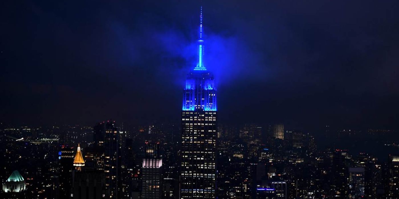 The Empire State Building lit up blue in New York City