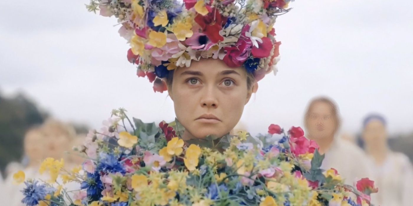 Florence Pugh as Dani Ardor in May Queen outfit, frowning in Midsommar