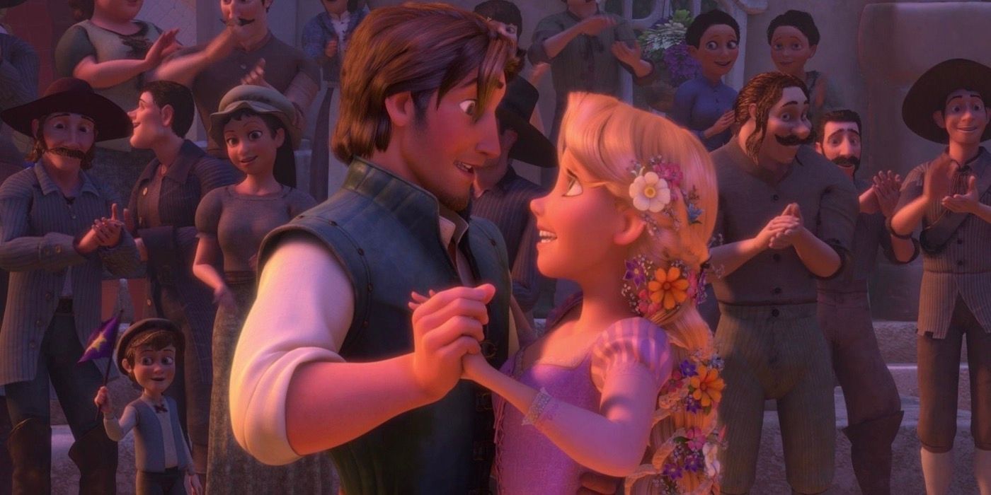 Flynn and Rapunzel dancing and smiling at the festival in Tangled