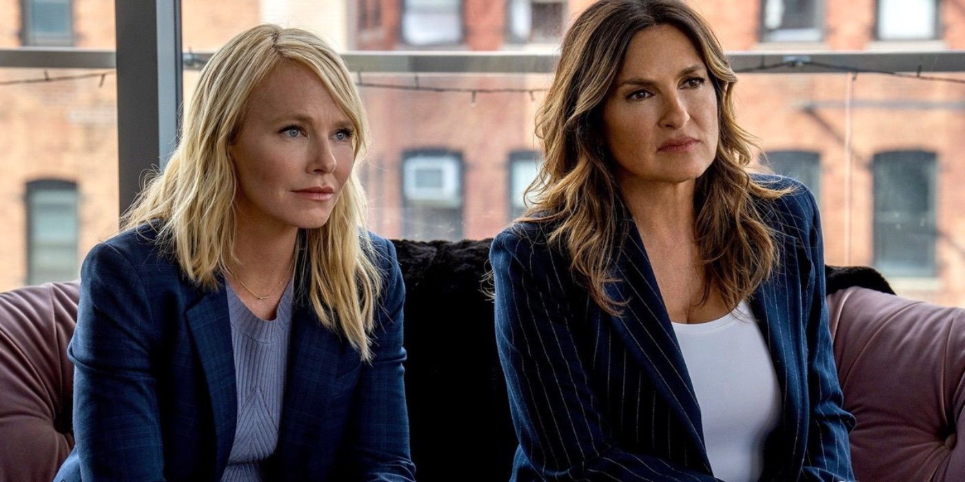 Benson and Rollins sitting on a couch in Law and Order: SVU