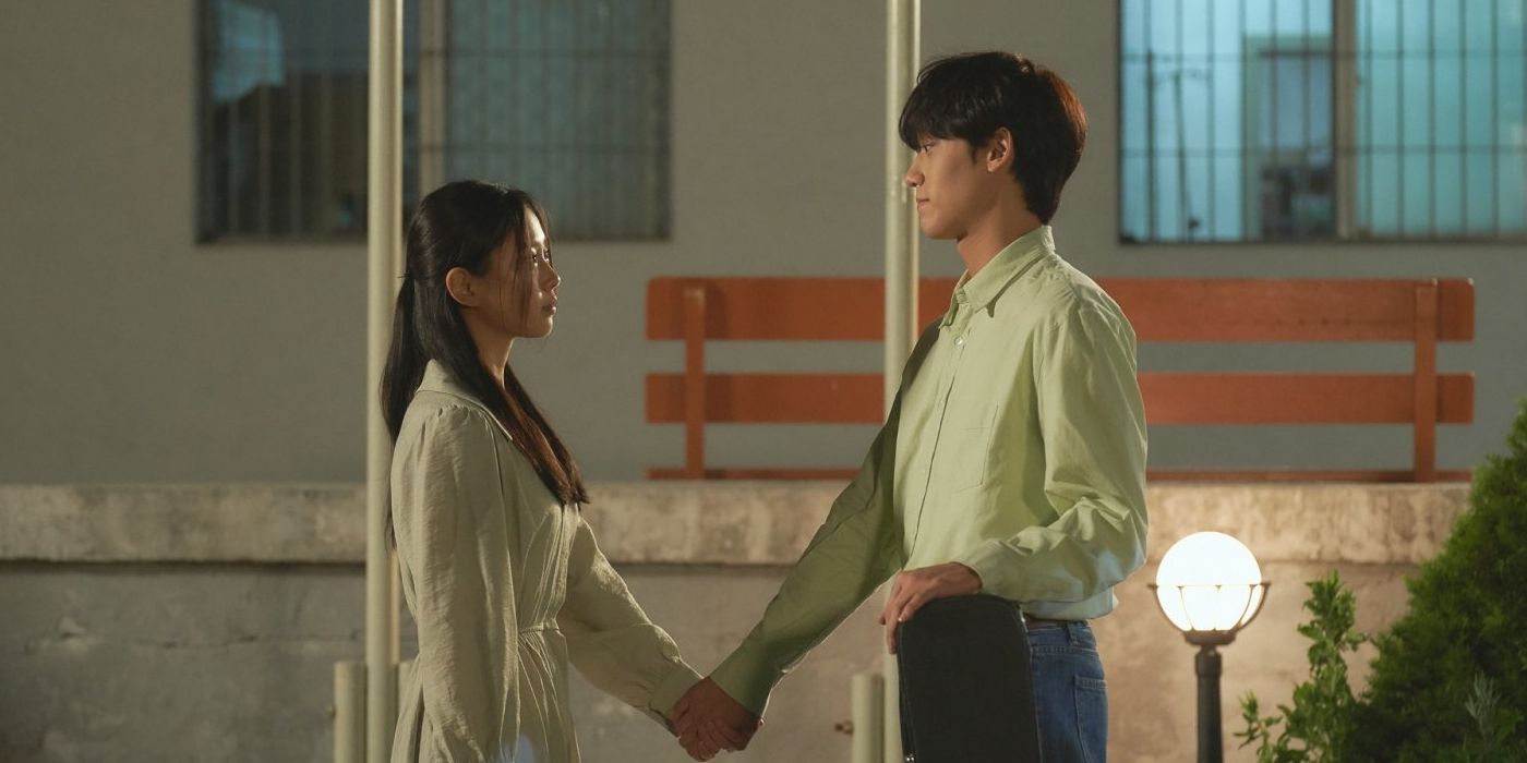 Go Min-Si and Lee Do-hyun holding hands in Youth of May