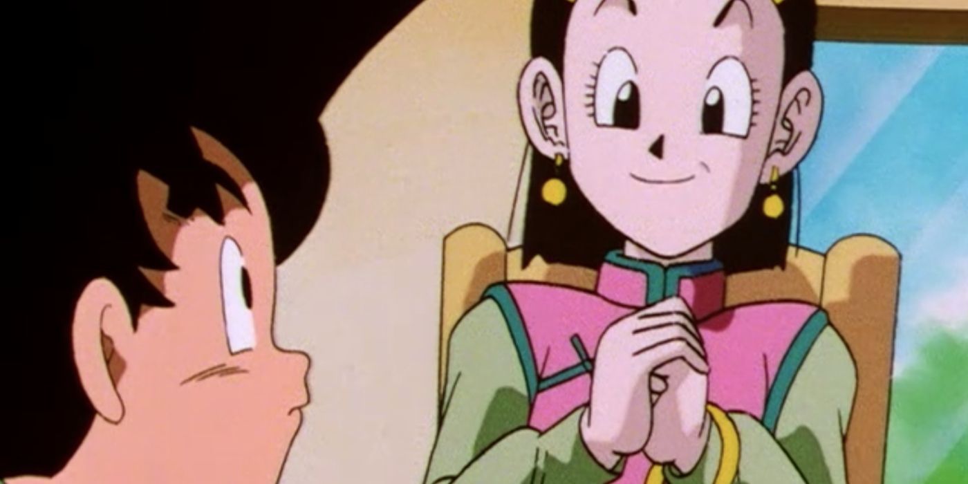 Chi-Chi smiling at a kid version of Goku in Dragon Ball GT.