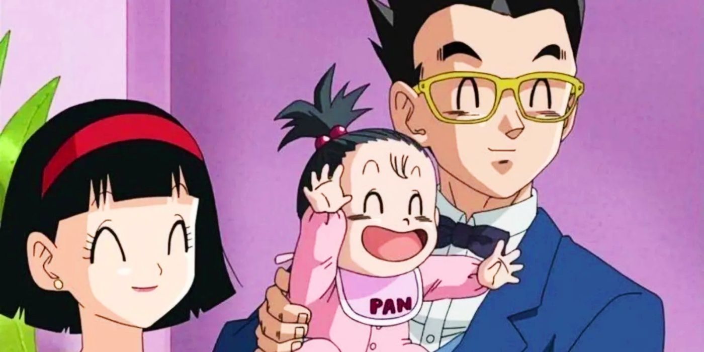 Gohan holding Pan while Videl stands next to them
