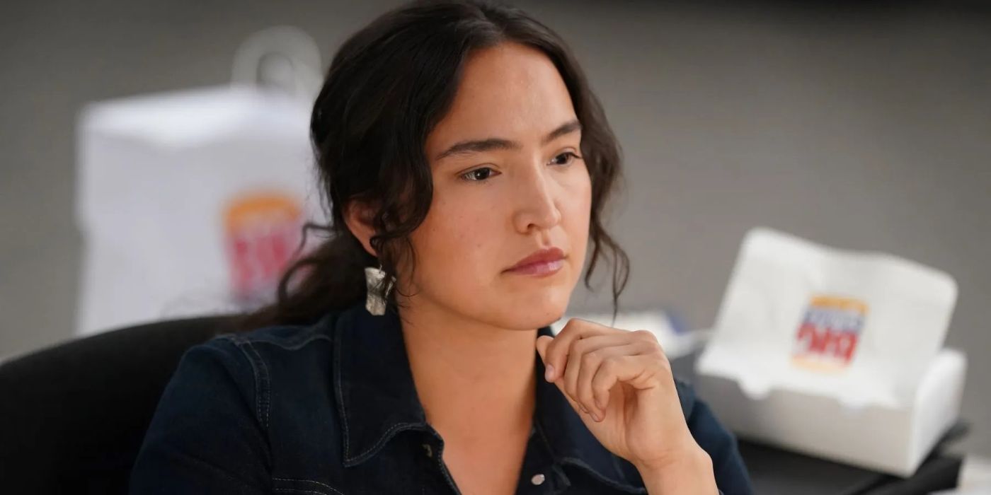 Grace Dove as Roz Friendly looking at something and wondering in Alaska Daily