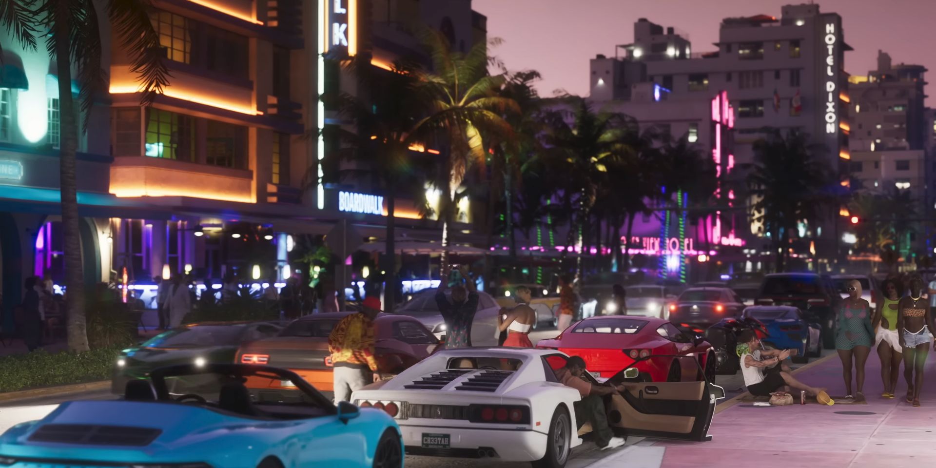 The main nightlife strip in the trailer for GTA 6. Lines of sports cars, neon-lit art deco buildings, and palm trees in a line down the middle.