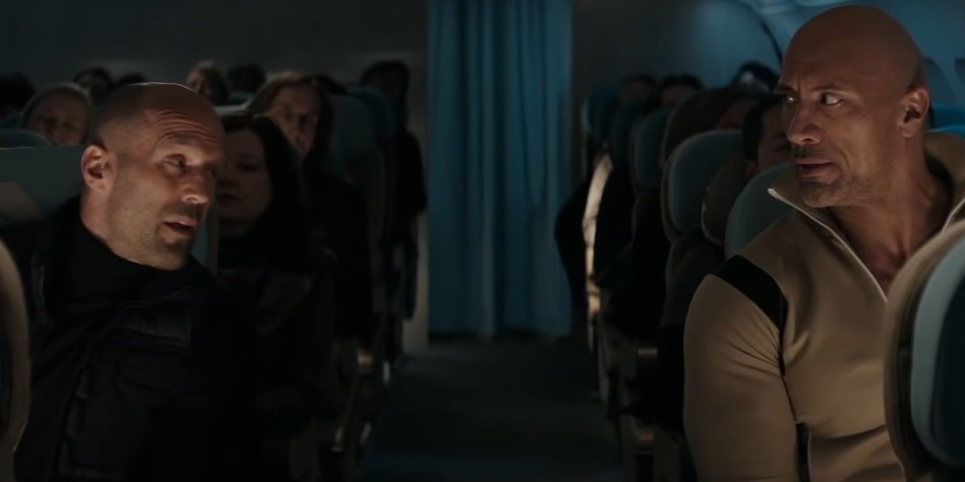 Luke Hobbs (Dwayne Johnson) and Deckard Shaw (Jason Statham) on a plane in Hobbs & Shaw