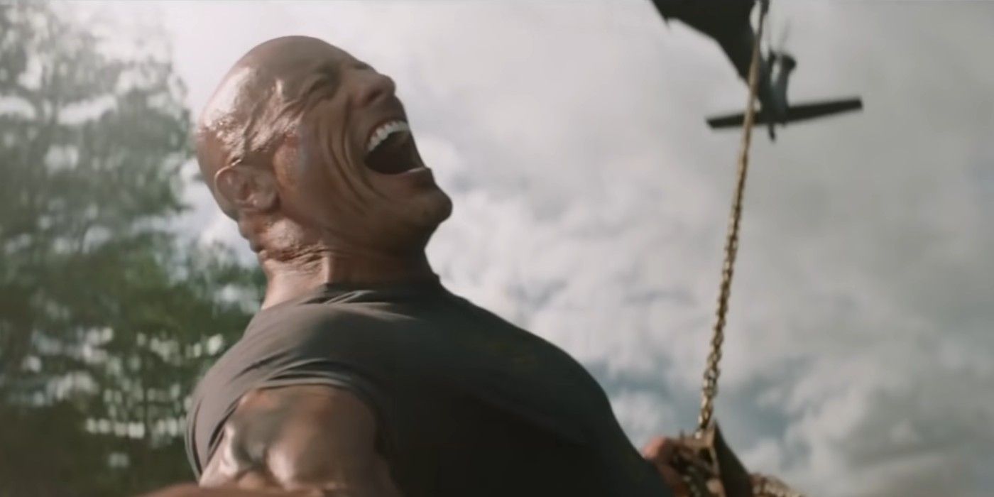 Luke Hobbs (Dwayne Johnson) holding back a helicopter using a chain in Hobbs & Shaw