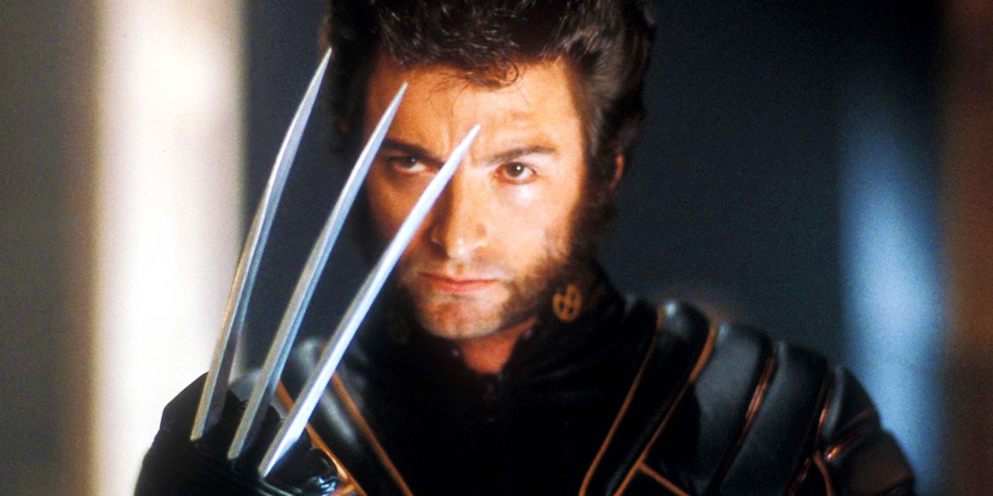 Wolverine de Hugh Jackman olhando para suas garras em X-Men de 2000
