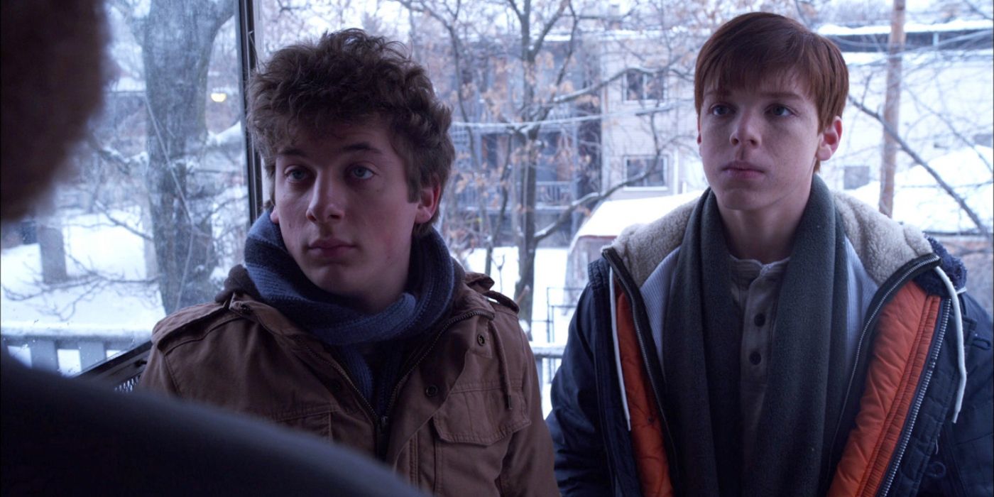 Cameron Monaghan as Ian and Jeremy Allen White as Lip at a door in Shameless US