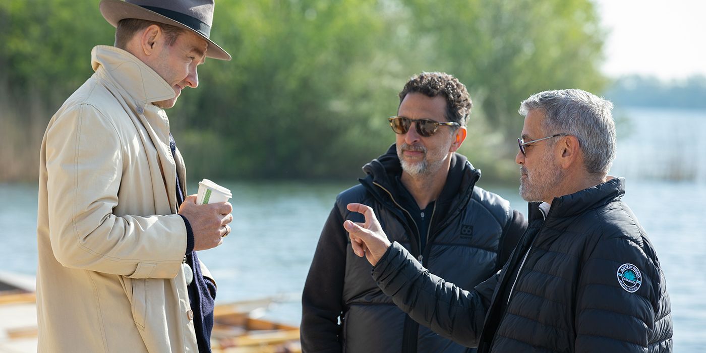 Image of George Clooney directing Joel Edgerton on the set of The Boys in the Boat