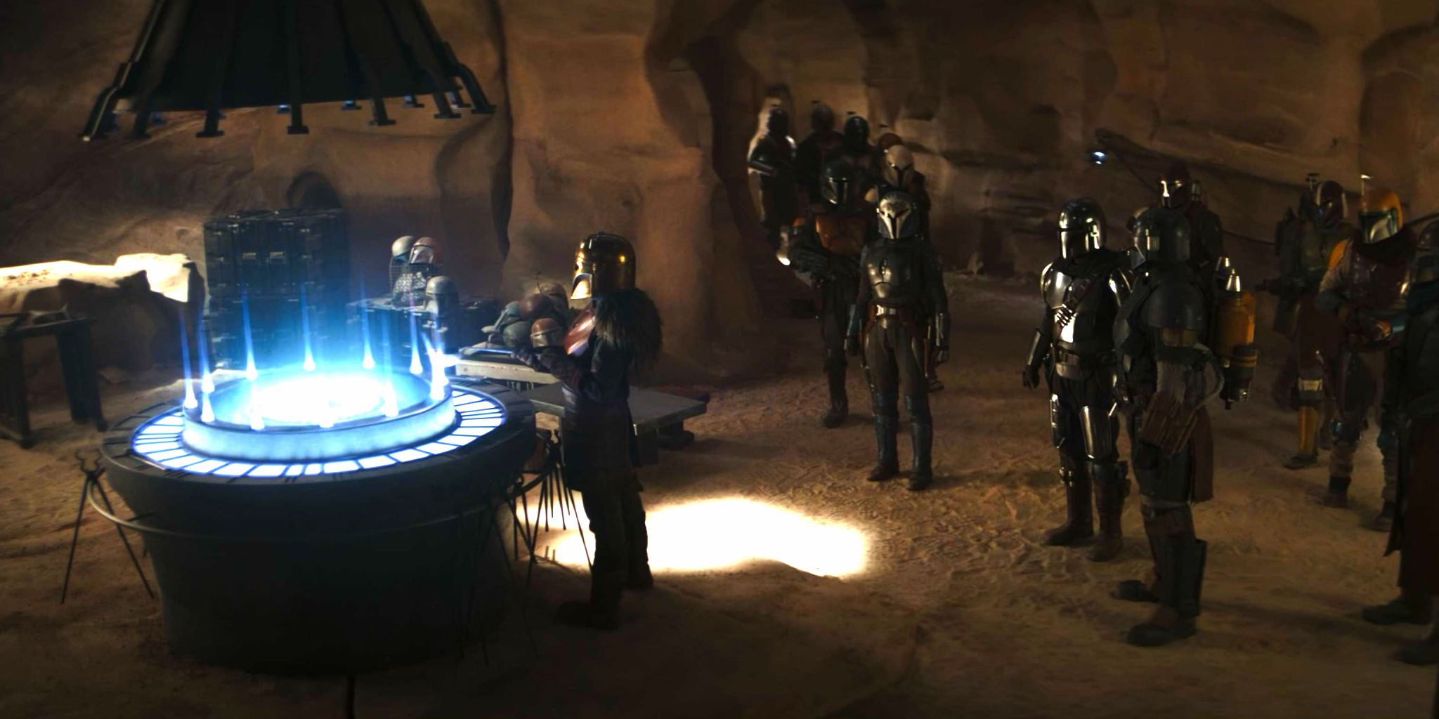 Din Djarin, Bo-Katan Kryze, the Armorer, Paz Vizsla, and more Mandalorians gather in the forge in The Mandalorian season 3 episode 3