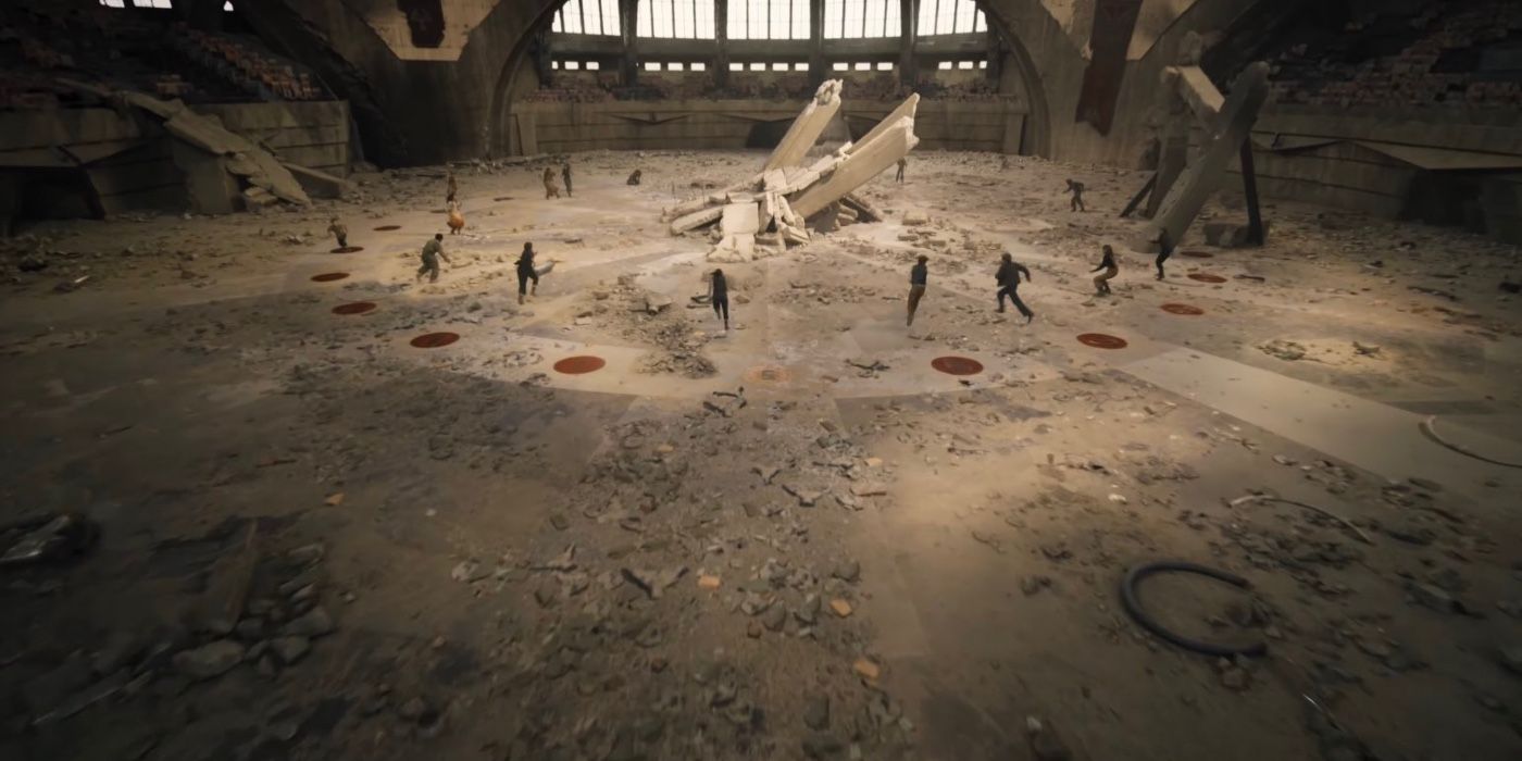 The tributes run to the center of the arena in The Ballad of Songbirds and Snakes. 