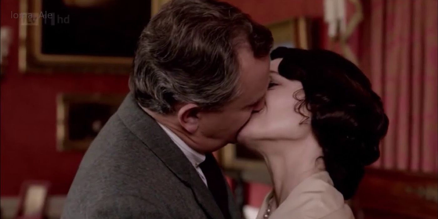 Robert and Cora Crawley are kissing on Downton Abbey.