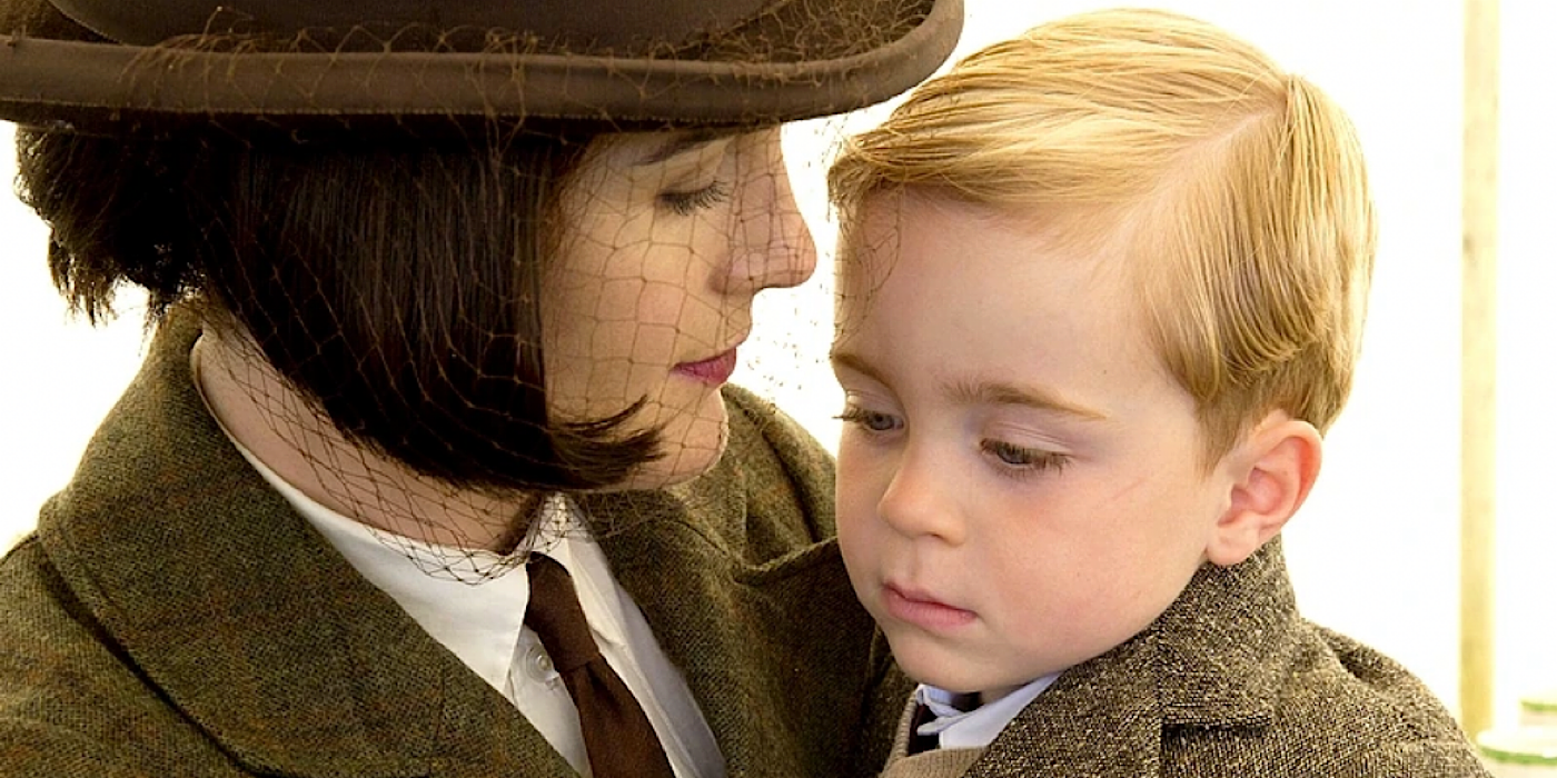 George Crowley being held by his mother, Lady Mary, in Downton Abbey.