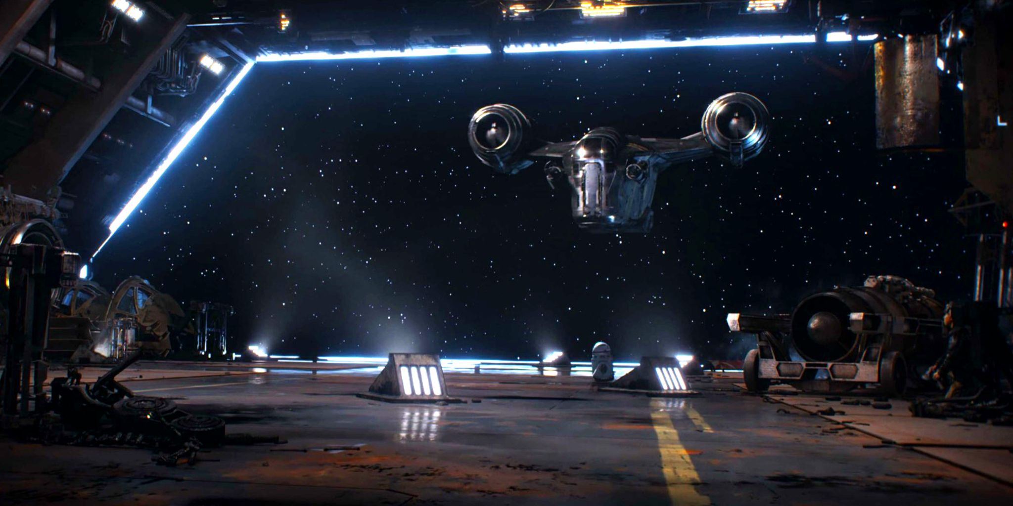 The Razor Crest flies inside the hangar of The Roost space station to land in The Mandalorian season 1, episode 6